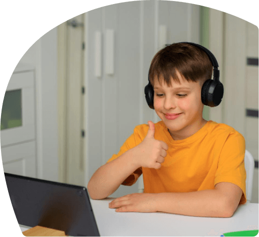 ZoniLive boy doing thumbs up in an online learning session, showing excitement and engagement