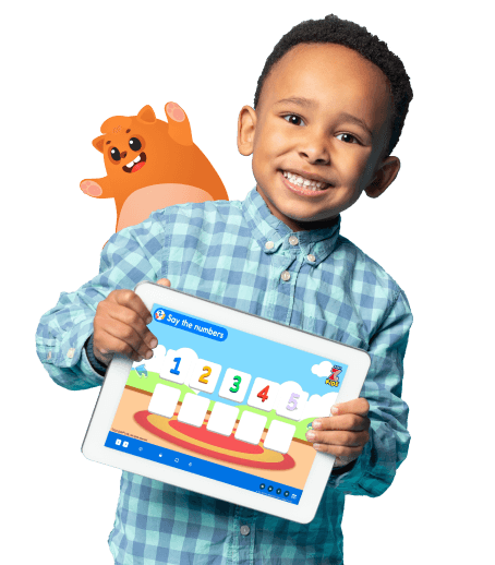 ZoniLive kid smiling while holding tablet teaching numbers in virtual classroom
